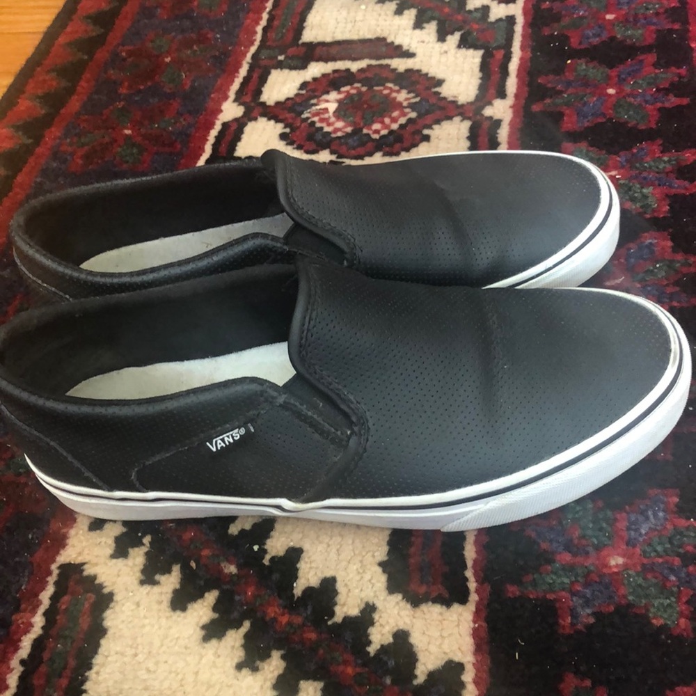 Vans black perforated leather slip ons